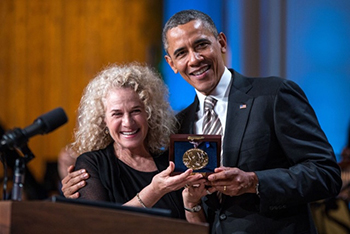 Carole King receiving The Library of Congress Gershwin Prize for Popular Song from President Barack Obama